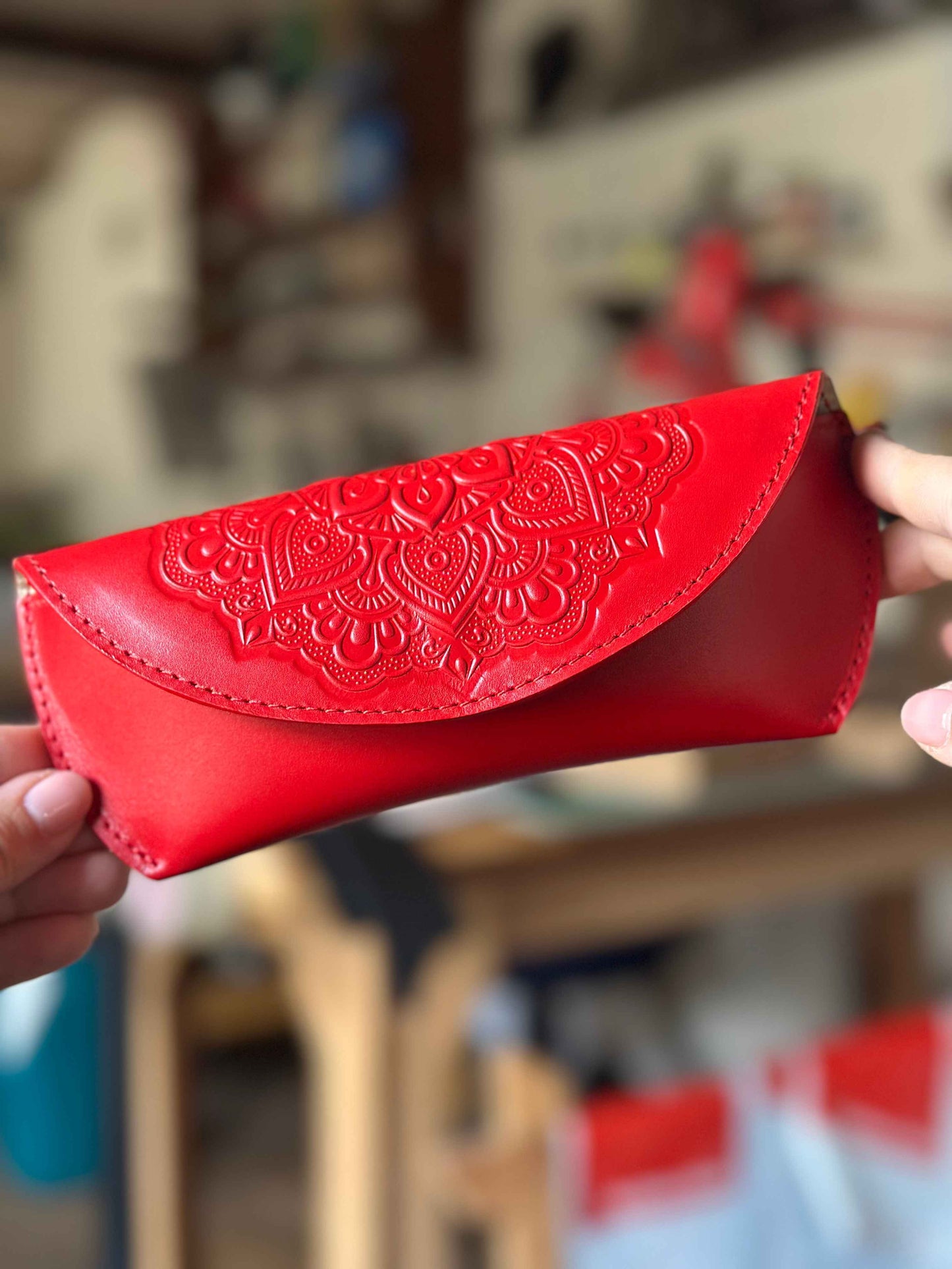 Leather case for glasses with floral embossing