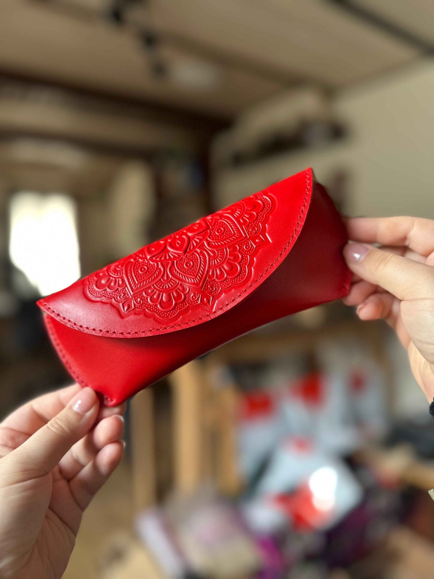 Leather case for glasses with floral embossing