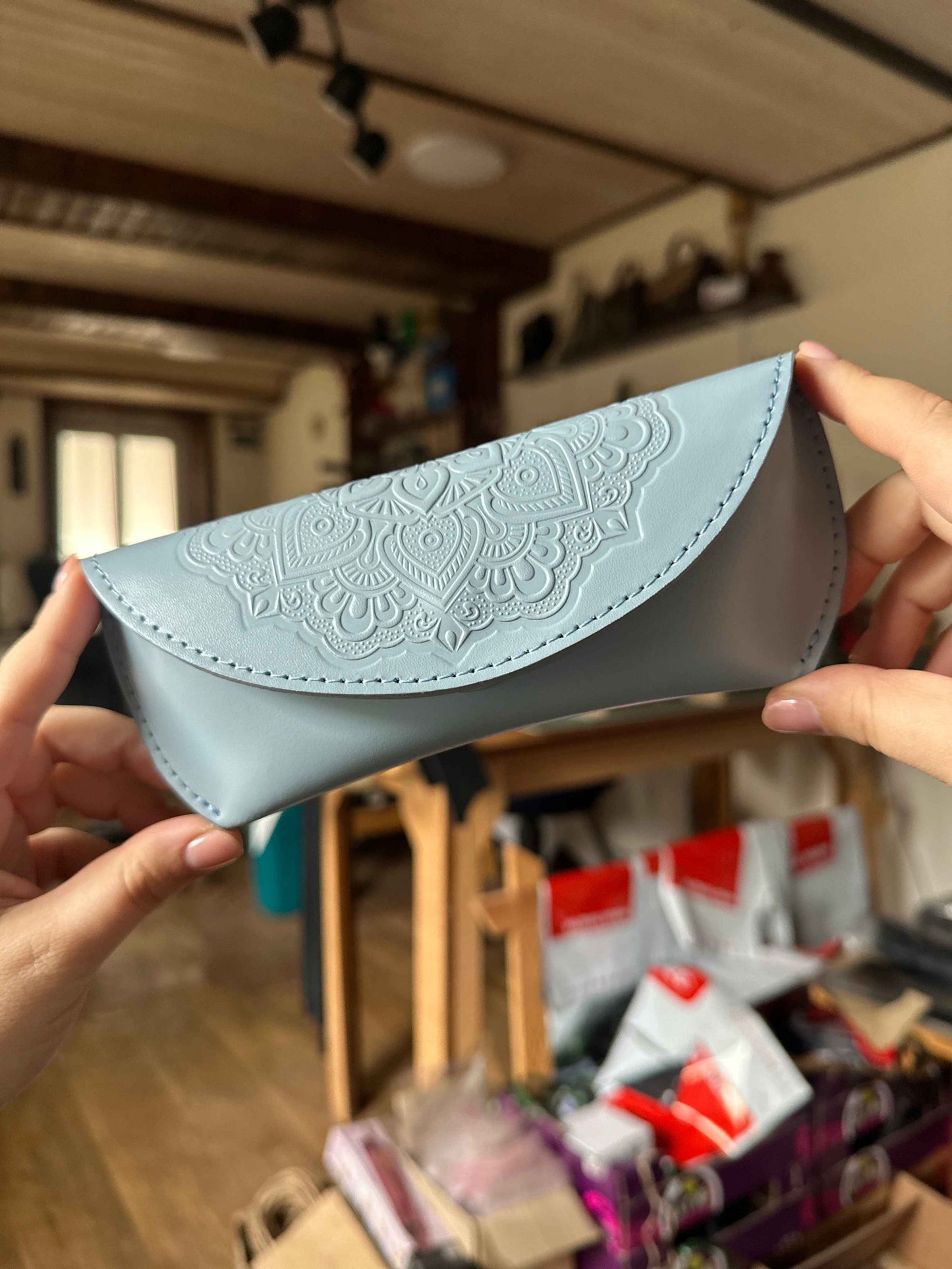 Leather case for glasses with floral embossing