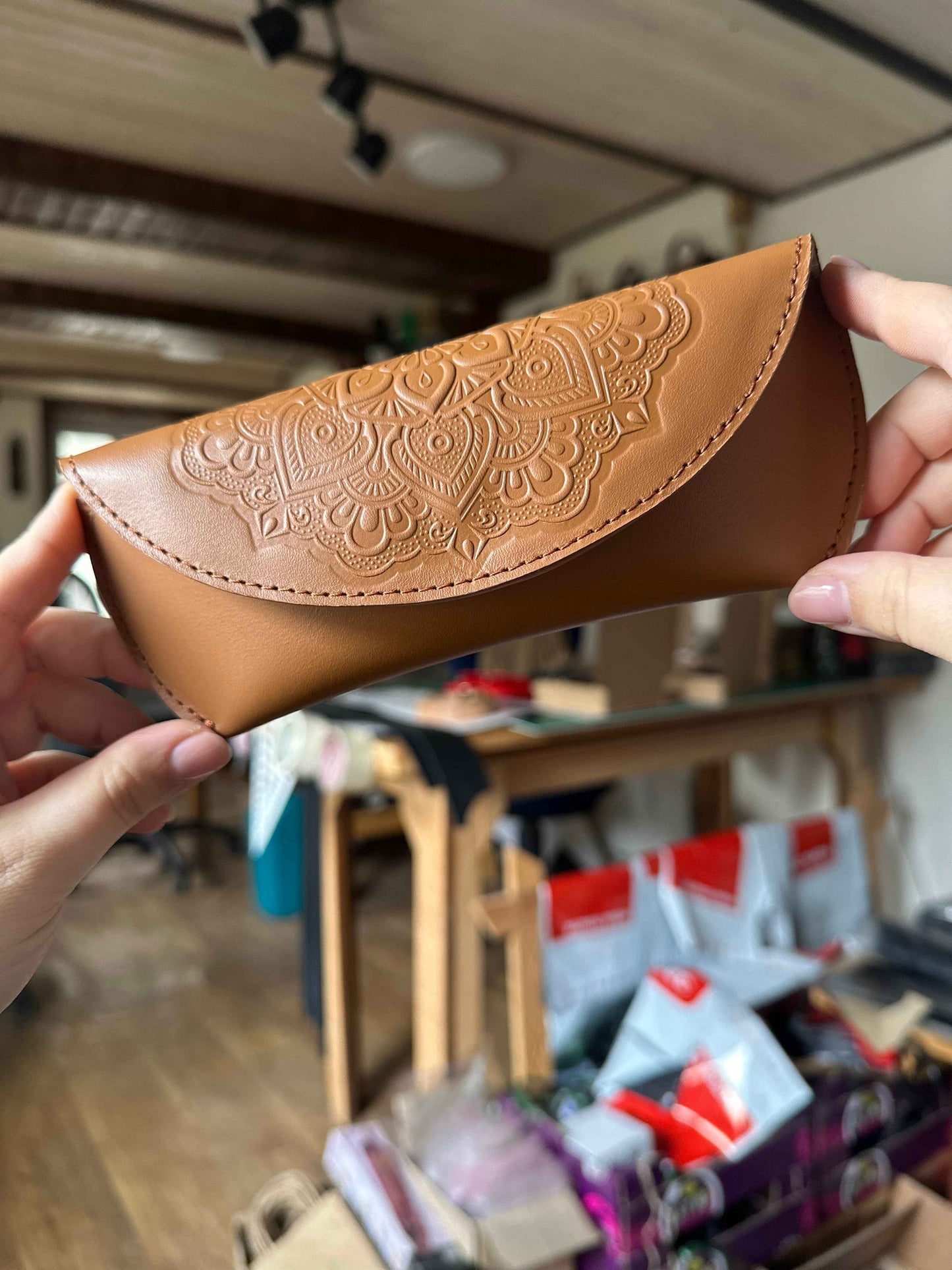 Leather case for glasses with floral embossing