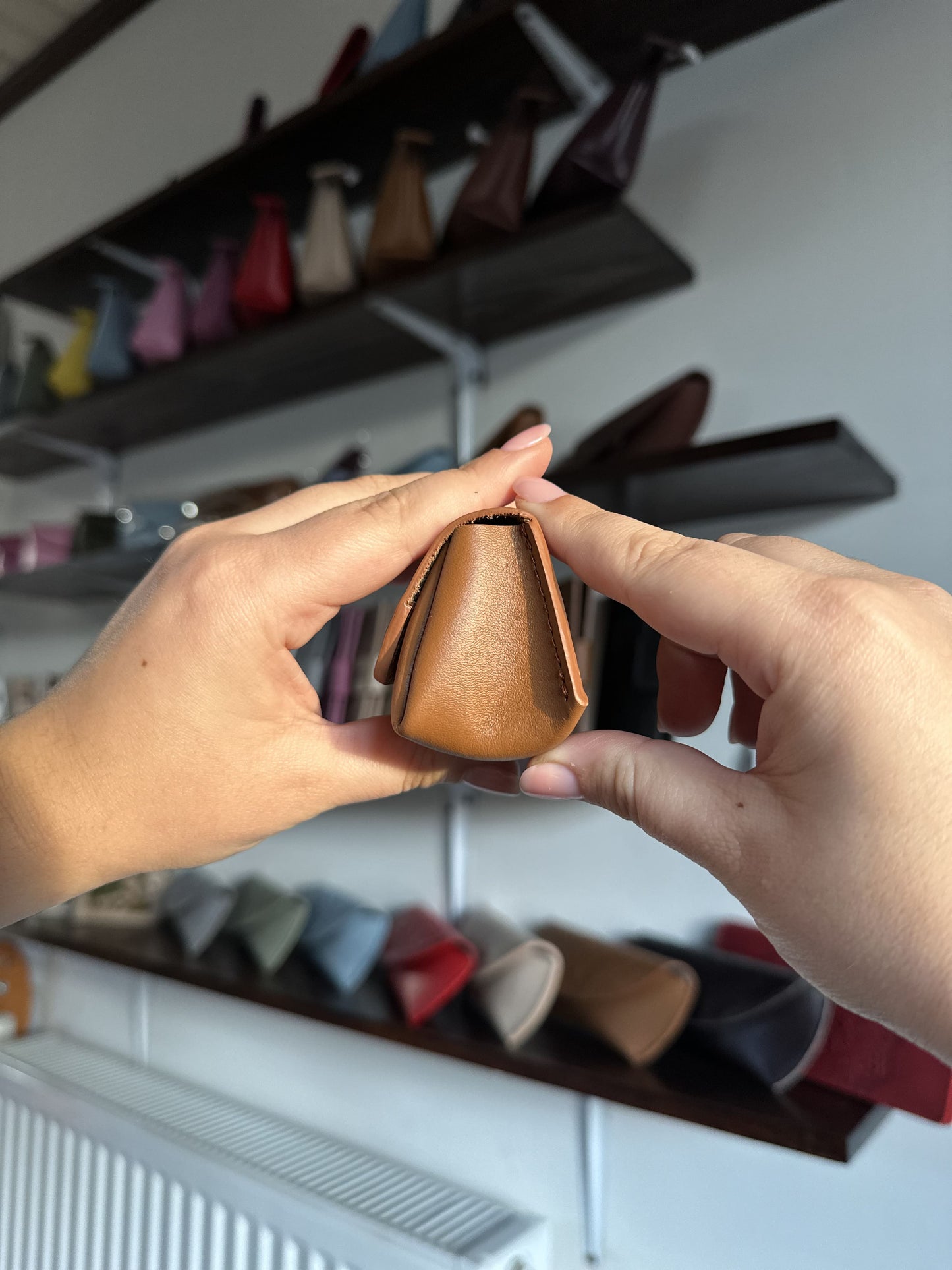 Leather coin box with floral embossing