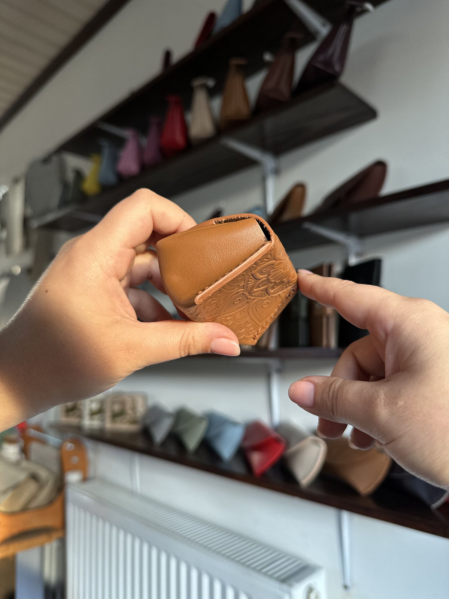 Leather coin box with floral embossing